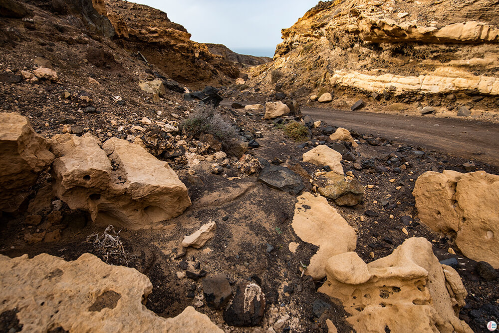 Path to Roque Del Moro through a small canyon, with interesting sandstone formations, Fuerteventura