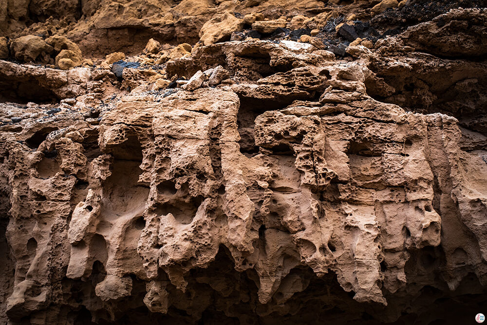 Eroded sandstone on the path leading to Roque Del Moro, Fuerteventura