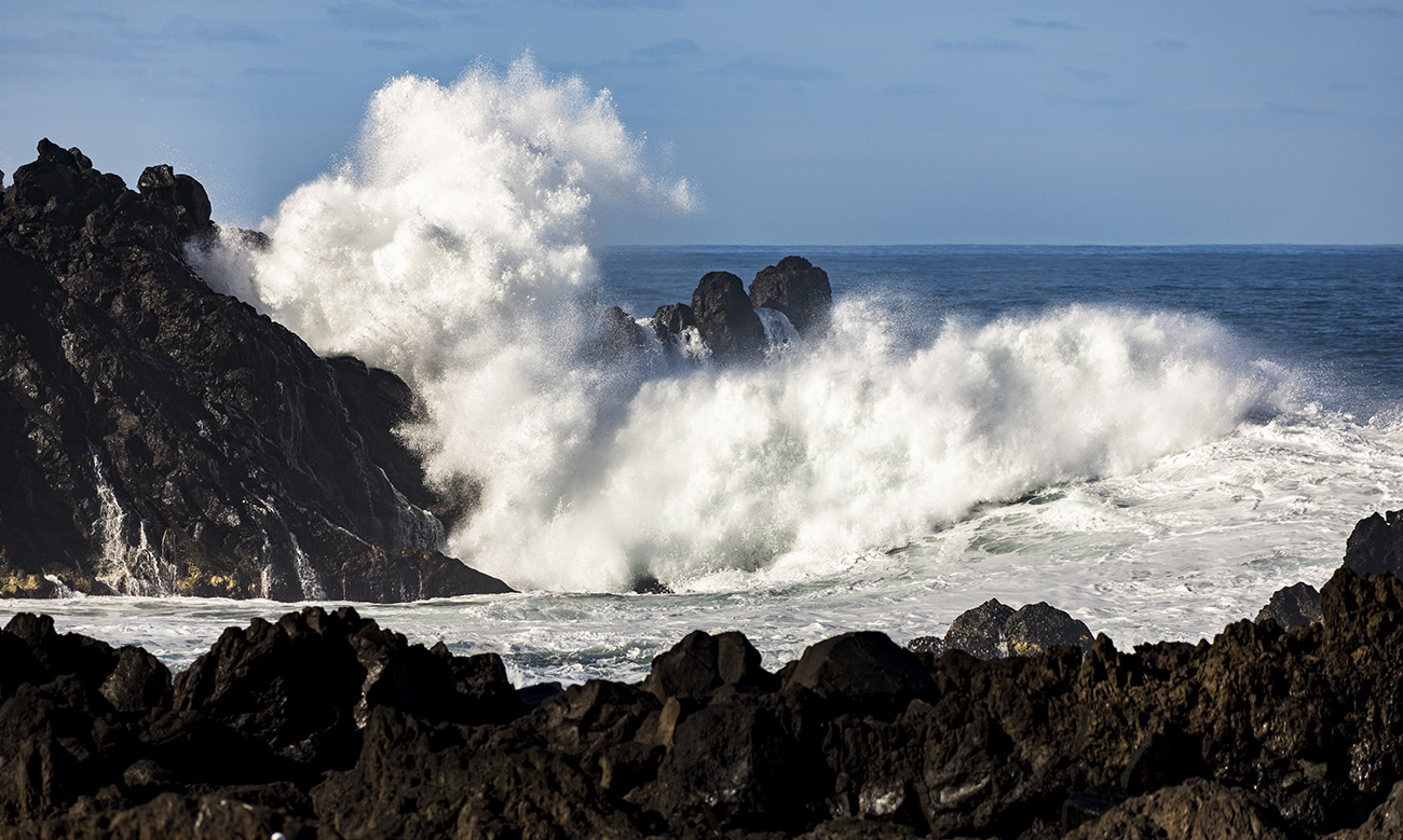 Wave smashing into rocks in Seixal, Madeira